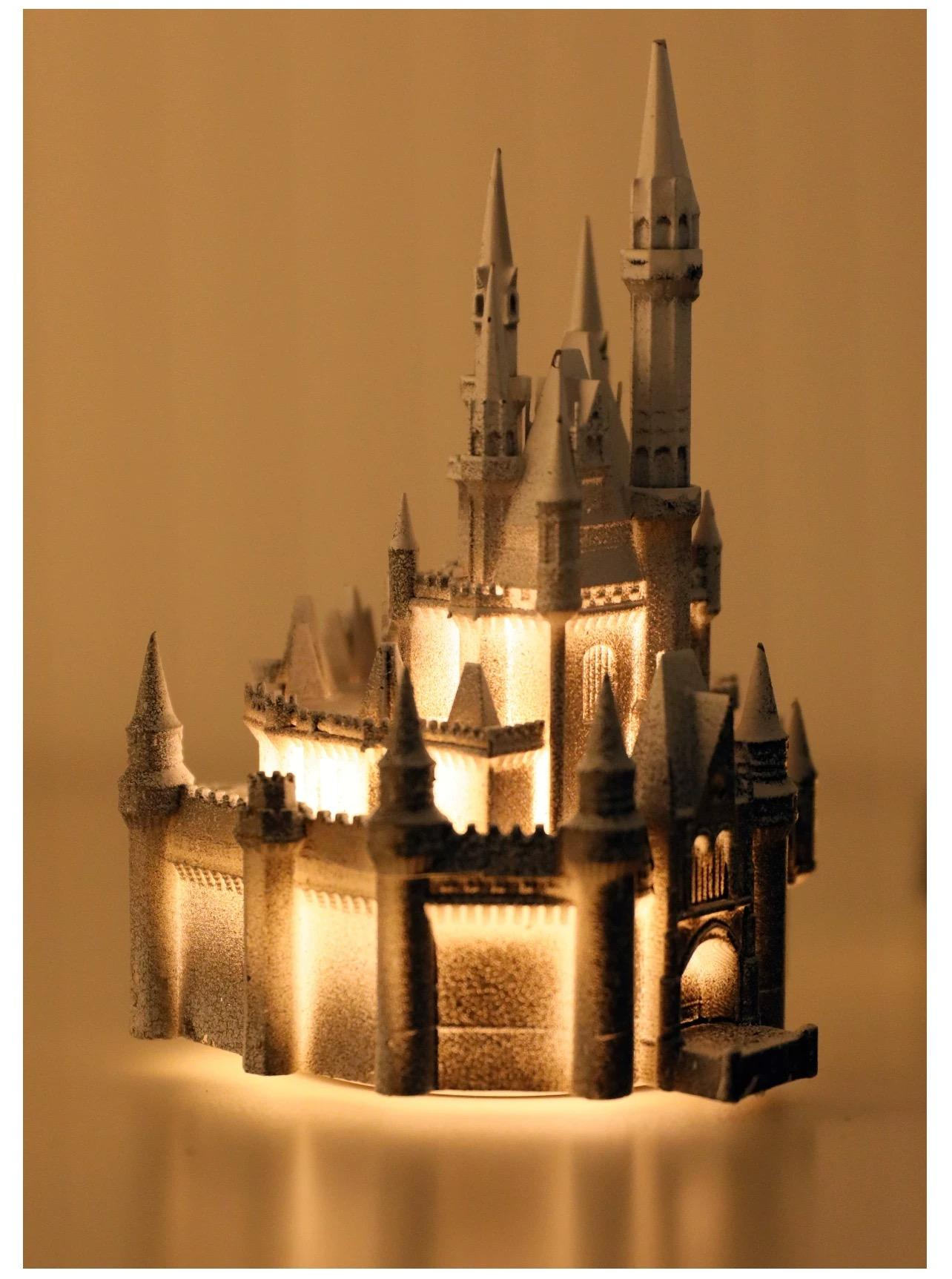 Glowing castle fridge magnet, a souvenir from St. Basil's Cathedral in Russia